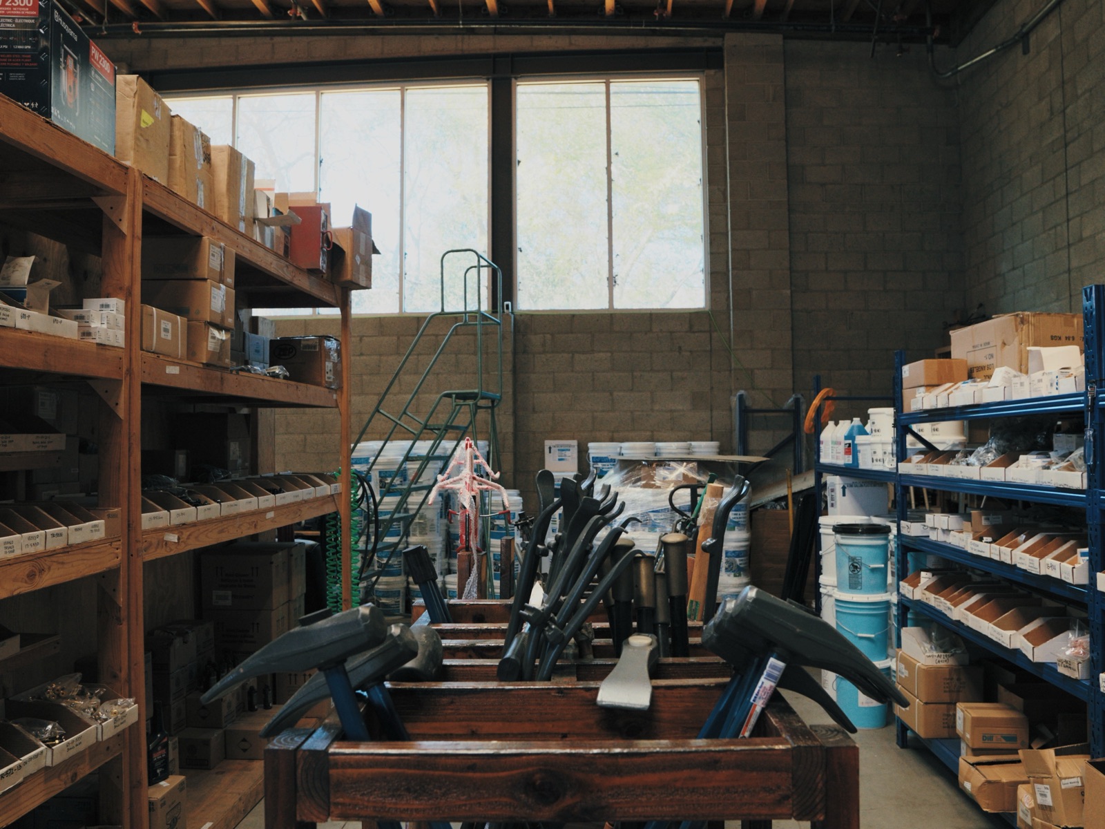 Tire irons and bead tools racked in the warehouse