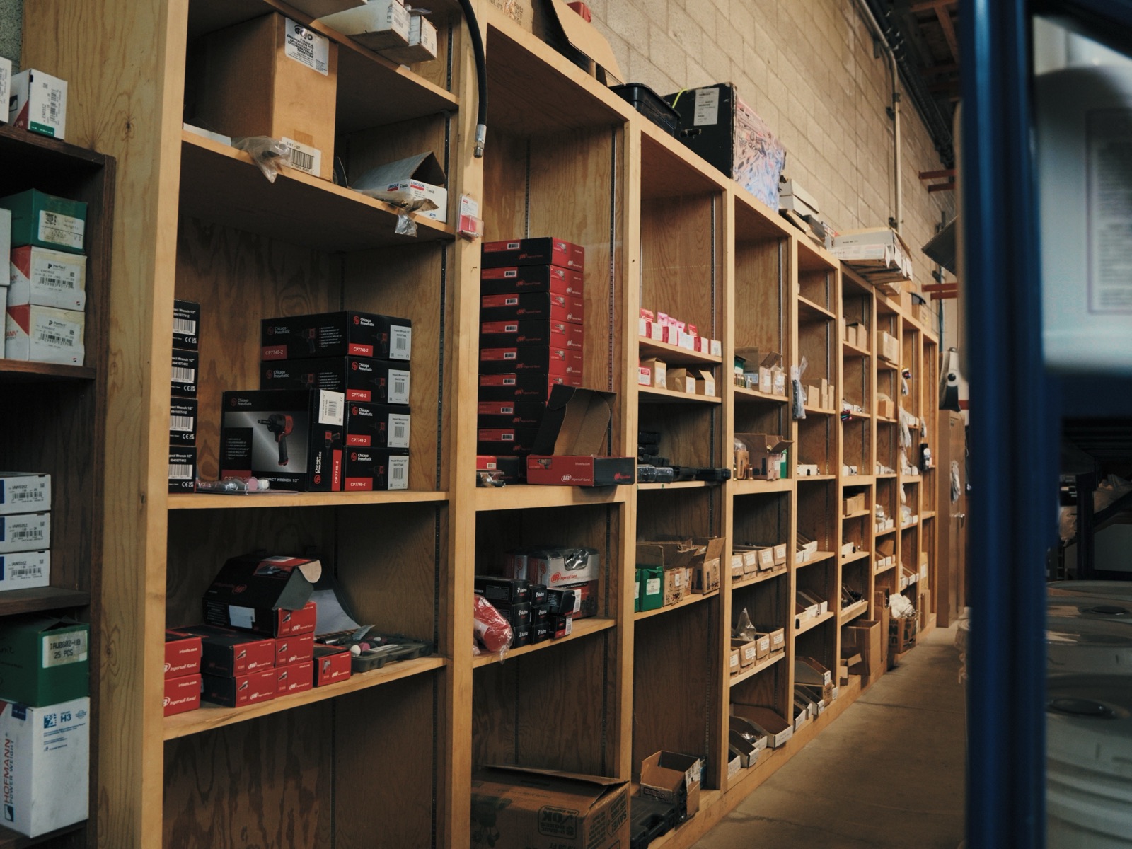 Shelves of boxed parts and accessories